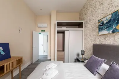 Cama o camas de una habitación en Waou Glam II Plaza España