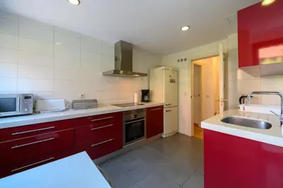 Una cocina o zona de cocina en Moderno Apartamento TEMPORAL Familiar con Terraza SOD11