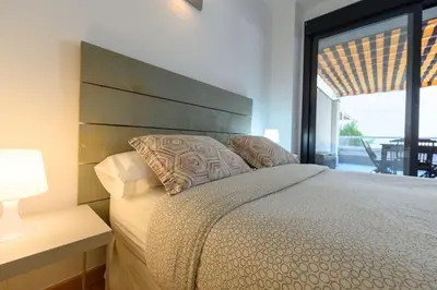 Cama o camas de una habitación en Moderno Apartamento TEMPORAL Familiar con Terraza SOD11