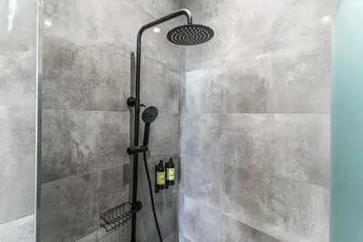 Un baño de VR Jerónima Apartments