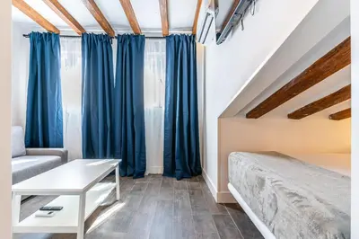 Cama o camas de una habitación en VR Estudios Apartments
