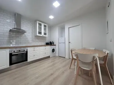 Una cocina o zona de cocina en Large Apartment in Madrid - Boto
