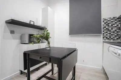 Una cocina o zona de cocina en Cozy apartment-1Bedroom 1Bath-Chamberí