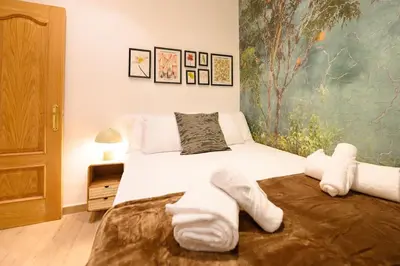 Cama o camas de una habitación en For You Rentals Encantador apartamento TEMPORAL de dos dormitorios PAL100