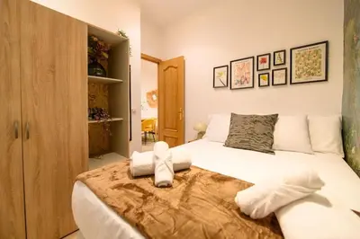 Cama o camas de una habitación en For You Rentals Encantador apartamento TEMPORAL de dos dormitorios PAL100