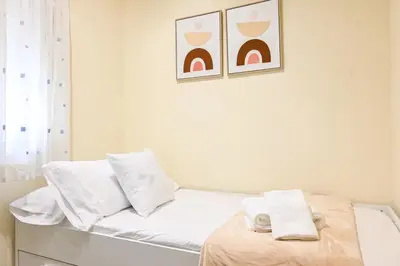 Cama o camas de una habitación en For You Rentals Coqueto Apartamento TEMPORAL de dos dormitorios EMB1545