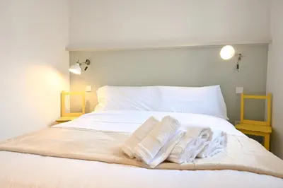 Cama o camas de una habitación en For You Rentals Encantador apartamento TEMPORAL AMP412