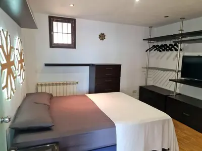 Cama o camas de una habitación en Ático en la Calle Fuencarrai con Gran Via