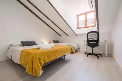 Cama o camas de una habitación en Exclusivo Ático con terraza en Plaza Mayor