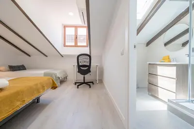 Cama o camas de una habitación en Exclusivo Ático con terraza en Plaza Mayor