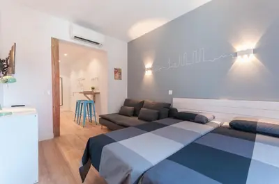 Cama o camas de una habitación en ºRA New Atocha City Centre WiFi AC SmartTVº