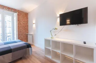 Cama o camas de una habitación en ºRA New Atocha City Centre WiFi AC SmartTVº