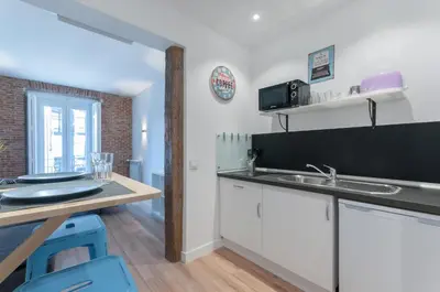 Una cocina o zona de cocina en ºRA New Atocha City Centre WiFi AC SmartTVº