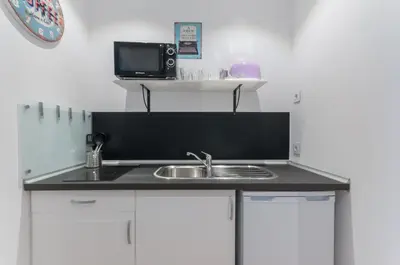 Una cocina o zona de cocina en ºRA New Atocha City Centre WiFi AC SmartTVº