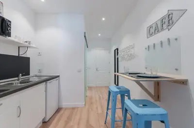Una cocina o zona de cocina en ººRA New Atocha City Centre WiFi AC SmartTVºº
