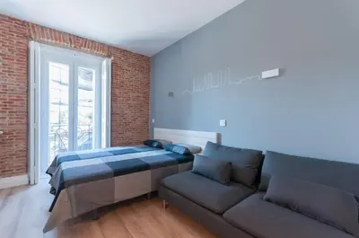 Cama o camas de una habitación en ººRA New Atocha City Centre WiFi AC SmartTVºº