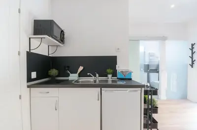 Una cocina o zona de cocina en ººººRA New Atocha City Centre WiFi AC SmartTVºººº