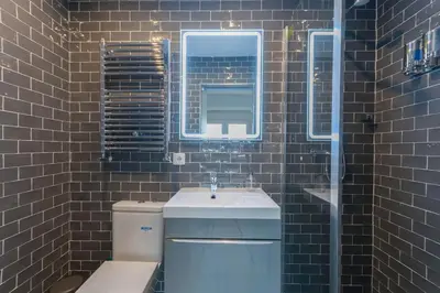 Un baño de ºººDL New Atocha City Centre WiFi AC SmartTVººº