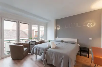 Cama o camas de una habitación en ºººDL New Atocha City Centre WiFi AC SmartTVººº