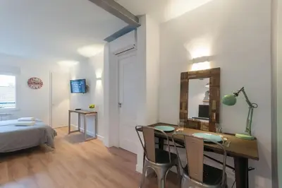 Cama o camas de una habitación en ººDL New Atocha City Centre WiFi AC SmartTVºº
