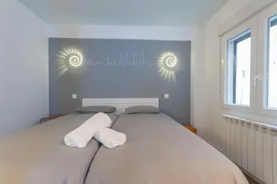 Cama o camas de una habitación en ºDL New Atocha City Centre WiFi AC SmartTVº