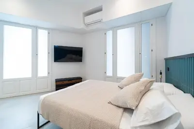 Cama o camas de una habitación en Soho Loft estilo industrial céntrico