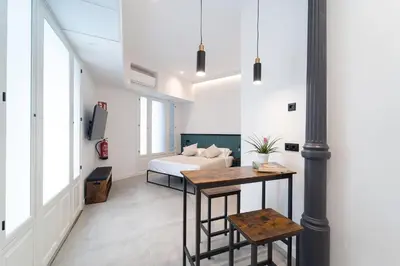 Zona de estar de Soho Loft estilo industrial céntrico