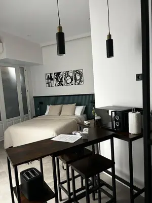 Zona de estar de Soho Loft estilo industrial céntrico