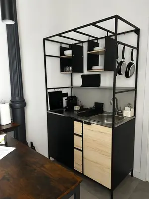 Una cocina o zona de cocina en Soho Loft estilo industrial céntrico