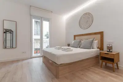 Cama o camas de una habitación en Modern Stylish-3Bedrooms 1Bathroom-Chamberí