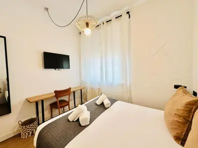 Cama o camas de una habitación en Autentic Boutique Moncloa
