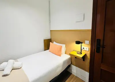 Cama o camas de una habitación en Autentic Boutique Moncloa