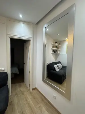 Cama o camas de una habitación en Apartamento con patio en Madrid centro