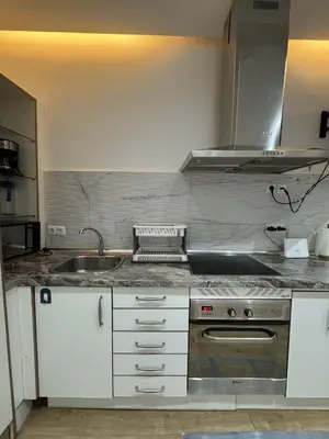 Una cocina o zona de cocina en Apartamento con patio en Madrid centro