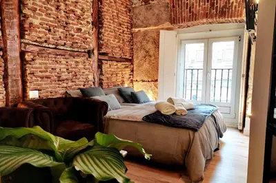 Cama o camas de una habitación en ºMY CityCentre SOL WiFi AC SmartTVº