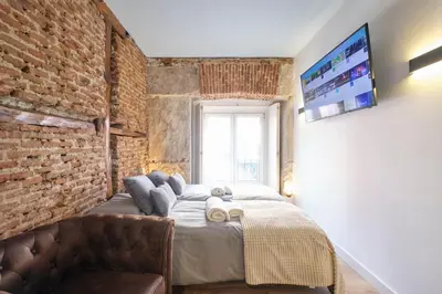 Cama o camas de una habitación en ºMY CityCentre SOL WiFi AC SmartTVº