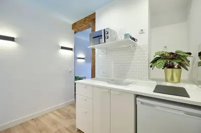 Una cocina o zona de cocina en ºººMY CityCentre SOL WiFi AC SmartTVººº