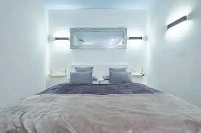 Cama o camas de una habitación en ººººMY CityCentre SOL WiFi AC SmartTVºººº