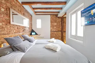 Cama o camas de una habitación en ºPY Historical CityCentre WiFi AC SmartTVº