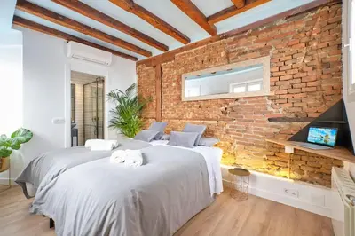 Cama o camas de una habitación en ºPY Historical CityCentre WiFi AC SmartTVº