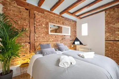 Cama o camas de una habitación en ºPY Historical CityCentre WiFi AC SmartTVº