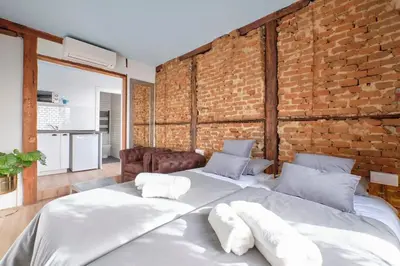 Cama o camas de una habitación en ººPY Historical CityCentre WiFi AC SmartTVºº