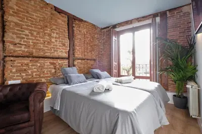 Cama o camas de una habitación en ºººººPY Historical CityCentre WiFi AC SmartTVººººº