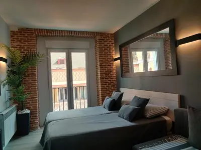Cama o camas de una habitación en ººEM Historical CityCentre WiFi AC SmartTVºº