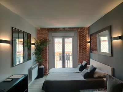 Cama o camas de una habitación en ººEM Historical CityCentre WiFi AC SmartTVºº