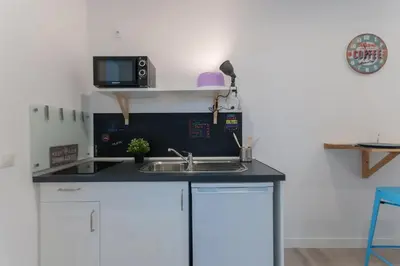Una cocina o zona de cocina en ººººEM Historical CityCentre WiFi AC SmartTVºººº