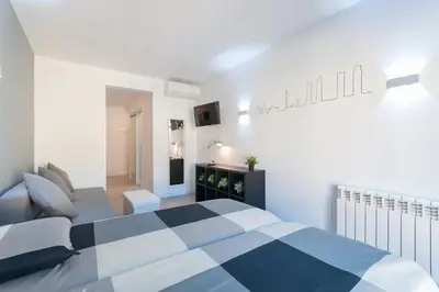 Cama o camas de una habitación en ººººEM Historical CityCentre WiFi AC SmartTVºººº