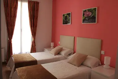 Cama o camas de una habitación en Casa de Huéspedes Galaica