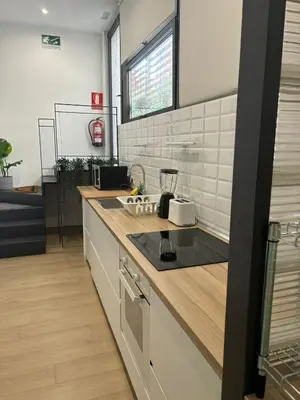 Una cocina o zona de cocina en Exyca Barrio Salamanca