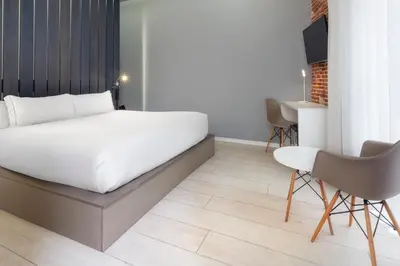 Cama o camas de una habitación en B&B HOTEL Madrid Centro Fuencarral 52